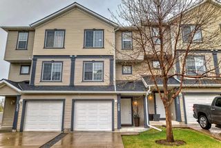 Photo 1: 128 Everhollow Heights SW in Calgary: Evergreen Row/Townhouse for sale : MLS®# A2133951