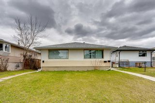 Main Photo: 4008 7 Avenue SW in Calgary: Rosscarrock Full Duplex for sale : MLS®# A2127182