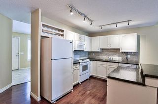 Photo 4: 122 Somervale Point SW in Calgary: Somerset Row/Townhouse for sale : MLS®# A2003484
