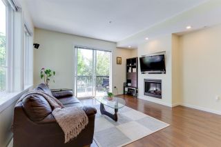 Photo 2: 110 2418 AVON Place in Port Coquitlam: Riverwood Townhouse for sale in "LINKS" : MLS®# R2583576