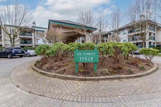 Photo 1: 106 19528 FRASER Highway in Surrey: Cloverdale BC Condo for sale in "Fairmont" (Cloverdale)  : MLS®# R2656719