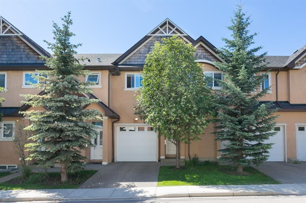 Main Photo: 151 23 Avenue NW in Calgary: Tuxedo Park Row/Townhouse for sale : MLS®# A2047705