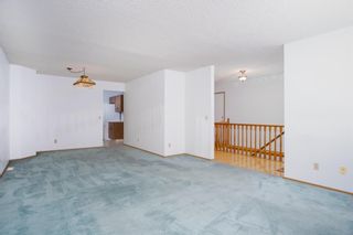 Photo 8: 56 Coach Side Terrace SW in Calgary: Coach Hill Row/Townhouse for sale : MLS®# A1163180