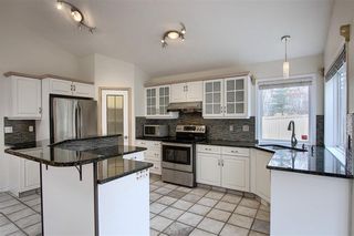 Photo 13: 243 ARBOUR CREST Road NW in Calgary: Arbour Lake Detached for sale : MLS®# C4295620