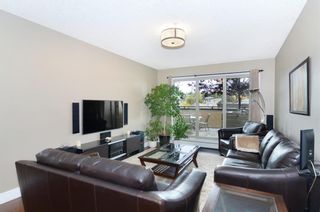 Photo 2: 206 1899 45 Street NW in Calgary: Montgomery Apartment for sale : MLS®# A1095005
