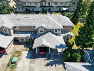 Photo 2: 5 9540 PRINCE CHARLES Boulevard in Surrey: Queen Mary Park Surrey Townhouse for sale in "PRINCE CHARLES COURT" : MLS®# R2732093