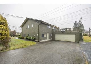 Photo 1: 7389 122A Street in Surrey: West Newton House for sale : MLS®# R2816220