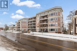Photo 2: 101 135 Pownal Street in Charlottetown: Condo for sale : MLS®# 202325326