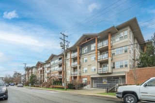 Photo 1: 407 20219 54A Avenue in Langley: Langley City Condo for sale in "Suede" : MLS®# R2747594