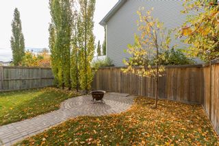 Photo 24: 69 Cougarstone Villas SW in Calgary: Cougar Ridge Detached for sale : MLS®# A1039696