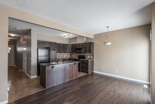 Photo 2: 501 620 Luxstone Landing SW: Airdrie Row/Townhouse for sale : MLS®# A2029244