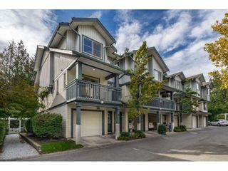 Photo 1: 34 19250 65 Avenue in Surrey: Clayton Townhouse for sale in "Sunberry Court" (Cloverdale)  : MLS®# R2409973