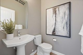 Photo 7: 102 Wolf Creek Rise SE in Calgary: C-281 Detached for sale : MLS®# A2104881