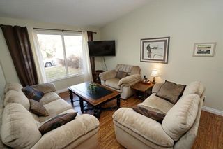Photo 2: 64 STRATHCONA Close SW in Calgary: Strathcona Park House for sale : MLS®# C4142880
