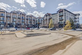 Photo 2: 1409 130 Panatella Street NW in Calgary: Panorama Hills Apartment for sale : MLS®# A2034336