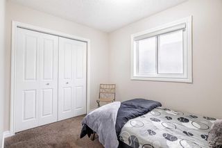 Photo 13: 60 Martinglen Mews NE in Calgary: Martindale Detached for sale : MLS®# A2129418