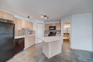 Photo 9: 106 60 Panatella Landing NW in Calgary: Panorama Hills Row/Townhouse for sale : MLS®# A1205484