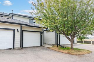 Photo 1: 17 15 Silver Springs Way NW: Airdrie Row/Townhouse for sale : MLS®# A1258010