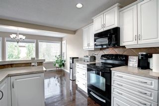 Photo 16: 28 Everbrook Link SW in Calgary: Evergreen Detached for sale : MLS®# A1223723