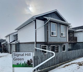 Photo 1: 103 Signal Hill Green SW in Calgary: Signal Hill Row/Townhouse for sale : MLS®# A2035094