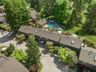 Photo 1: 415 4001 MT SEYMOUR Parkway in North Vancouver: Roche Point Townhouse for sale in "The Maples" : MLS®# R2780586