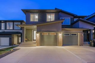 Photo 1: 129 Carringvue Park NW in Calgary: Carrington Semi Detached (Half Duplex) for sale : MLS®# A2129330