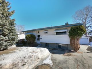 Photo 1: 673 Elmhurst Road in Winnipeg: House for sale (1G)  : MLS®# 202207351