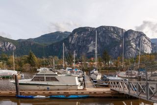 Photo 1: 102 1468 PEMBERTON Avenue in Squamish: Downtown SQ Condo for sale in "MARINA ESTATES" : MLS®# R2626127