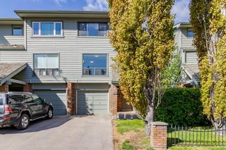 Main Photo: 121 Point Drive NW in Calgary: Point McKay Row/Townhouse for sale : MLS®# A1224400