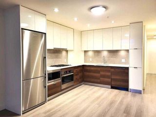Photo 7: 214 138 Waterfront Court SW in Calgary: Chinatown Apartment for sale : MLS®# A2112901
