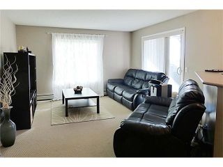 Photo 8: 2441 8 BRIDLECREST Drive SW in Calgary: Bridlewood Condo for sale : MLS®# C4084322