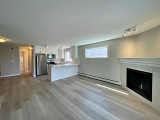 Photo 4: 317 20 Sierra Morena Mews SW in Calgary: Signal Hill Apartment for sale : MLS®# A1240832