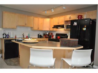 Photo 3: 2115 303 ARBOUR CREST Drive NW in Calgary: Arbour Lake Condo for sale : MLS®# C4092721