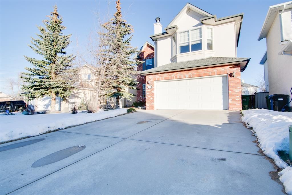 Main Photo: 235 Strathridge Place SW in Calgary: Strathcona Park Detached for sale : MLS®# A2012386
