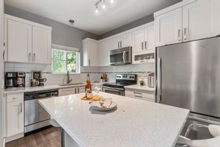 Photo 9: 19 13864 HYLAND Road in Surrey: East Newton Townhouse for sale in "TEO" : MLS®# R2781178