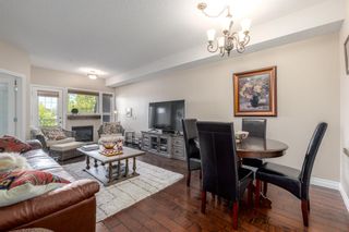 Photo 15: 210 248 Sunterra Ridge Place: Cochrane Apartment for sale : MLS®# A2053195