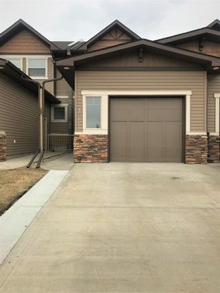 Photo 1: 105 150 Vanier Drive: Red Deer Row/Townhouse for sale : MLS®# A1189866