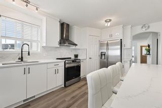 Photo 4: 199 Applestone Park SE in Calgary: Applewood Park Detached for sale : MLS®# A2050171