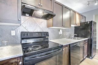 Photo 10: 105 4127 Bow Trail SW in Calgary: Rosscarrock Apartment for sale : MLS®# A1080853