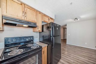 Photo 11: 1306 5 Country Village Park NE in Calgary: Country Hills Village Apartment for sale : MLS®# A2130261