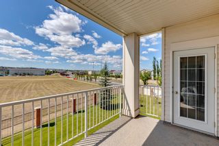 Photo 1: 1320 151 Country Village Road NE in Calgary: Country Hills Village Apartment for sale : MLS®# A1161620