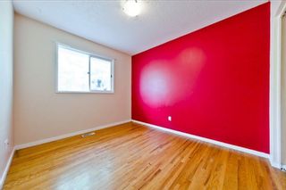 Photo 8: 539 HUNTERPLAIN Hill NW in Calgary: Huntington Hills Detached for sale : MLS®# A1024979