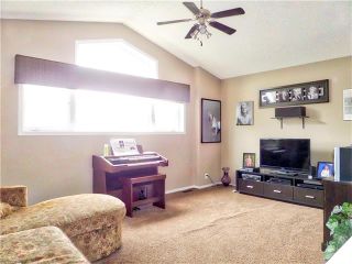Photo 22: 1010 BRIDLEMEADOWS Manor SW in Calgary: Bridlewood House for sale : MLS®# C4065914