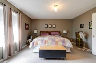 Photo 21: 35 Cougarstone Landing SW in Calgary: Cougar Ridge Detached for sale : MLS®# A2063797