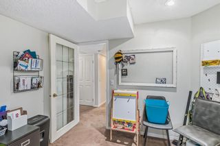 Photo 21: 416 Springbank Place SW in Calgary: Springbank Hill Detached for sale : MLS®# A2048259
