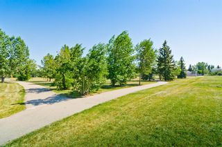 Photo 7: 943 CANNOCK Road SW in Calgary: Canyon Meadows Detached for sale : MLS®# A1250481