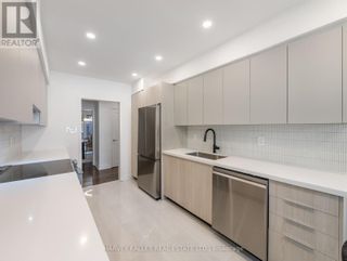Photo 14: 169 TORRESDALE AVE in Toronto: House for sale : MLS®# C7311888