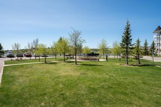 Photo 2: 1212 5 Country Village Park NE in Calgary: Country Hills Village Apartment for sale : MLS®# A2049953