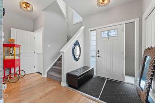 Photo 2: 303 Hillcrest Drive SW: Airdrie Row/Townhouse for sale : MLS®# A2054077