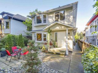 Photo 1: 1749 E 13TH Avenue in Vancouver: Grandview VE 1/2 Duplex for sale (Vancouver East)  : MLS®# R2115872